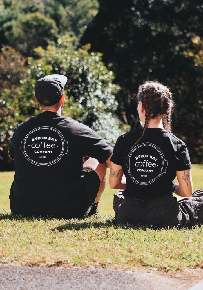 Boy and girl sitting on the grass