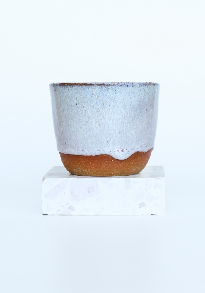 Handcrafted coffee cup in purple glaze