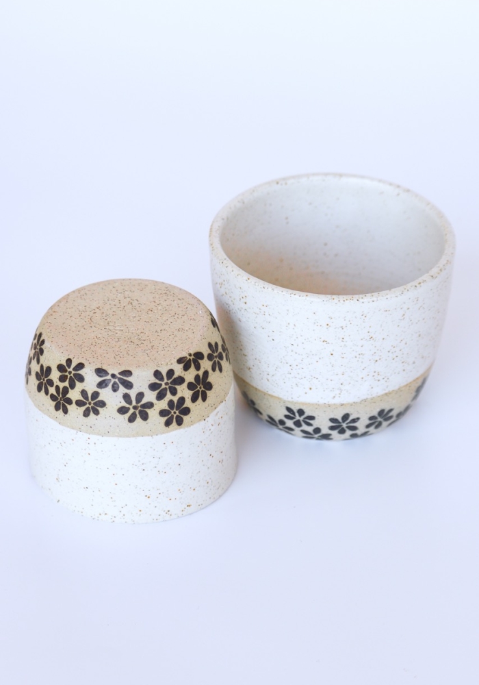 Handmade cup with flower motifs made in Byron Bay