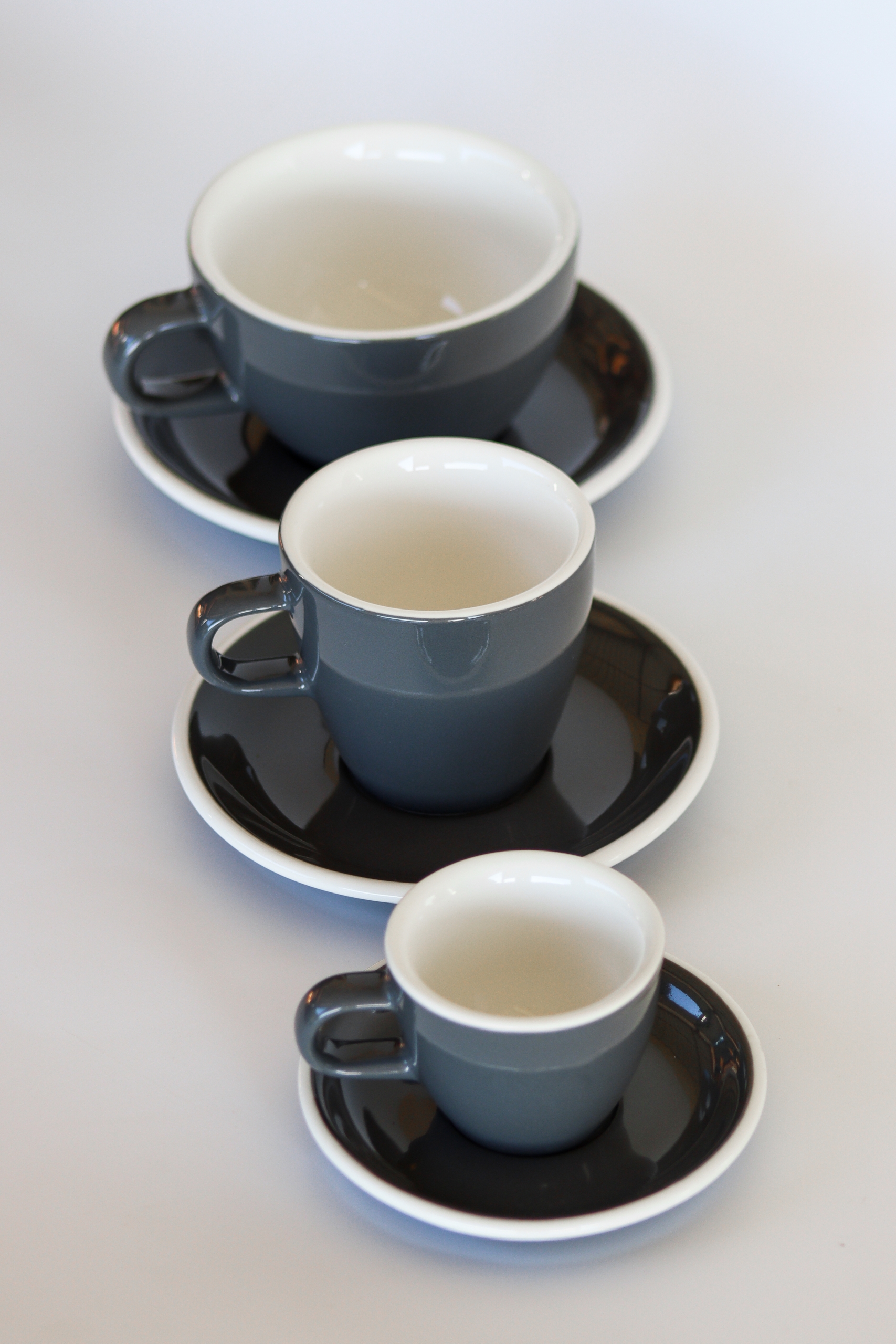 Acme Coffee Cups On Saucers