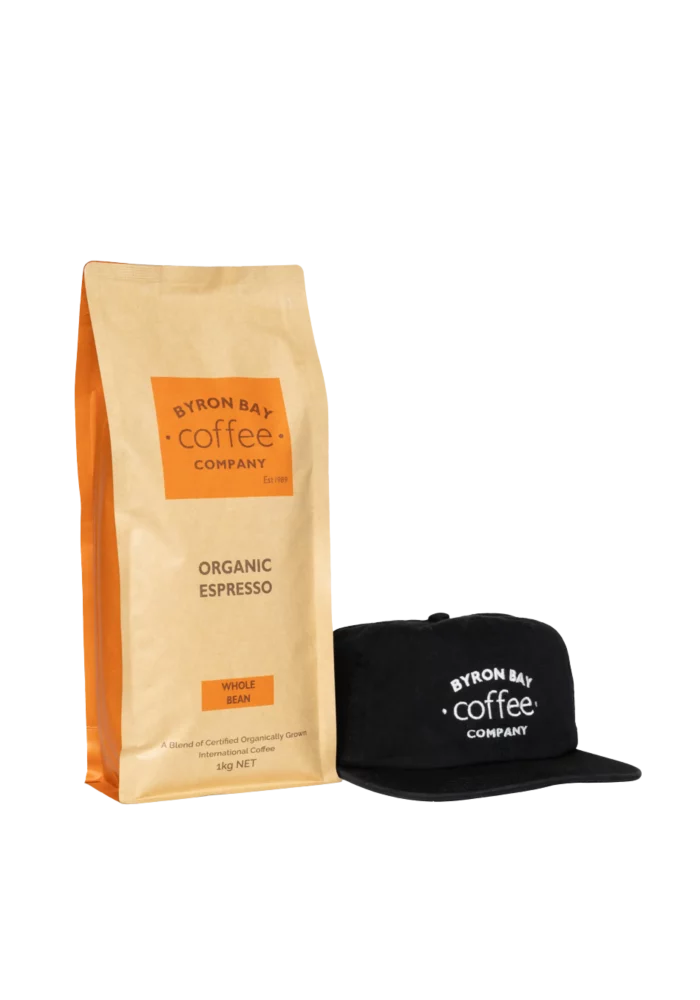 1 Kilo bag of Organic Coffee next to a BBCC cap