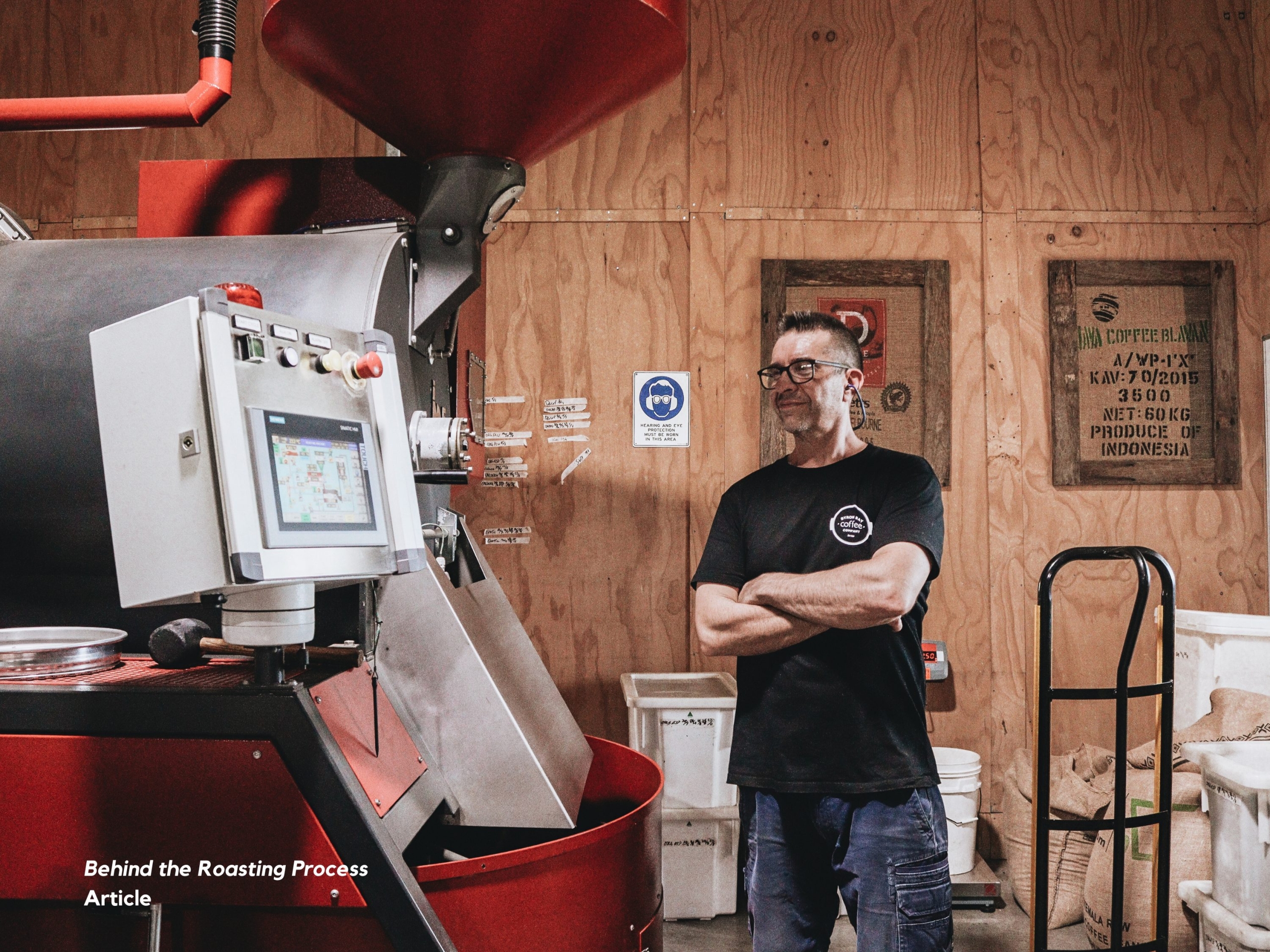 Coffee Roaster Standing in Front Of IMF Coffee Roaster