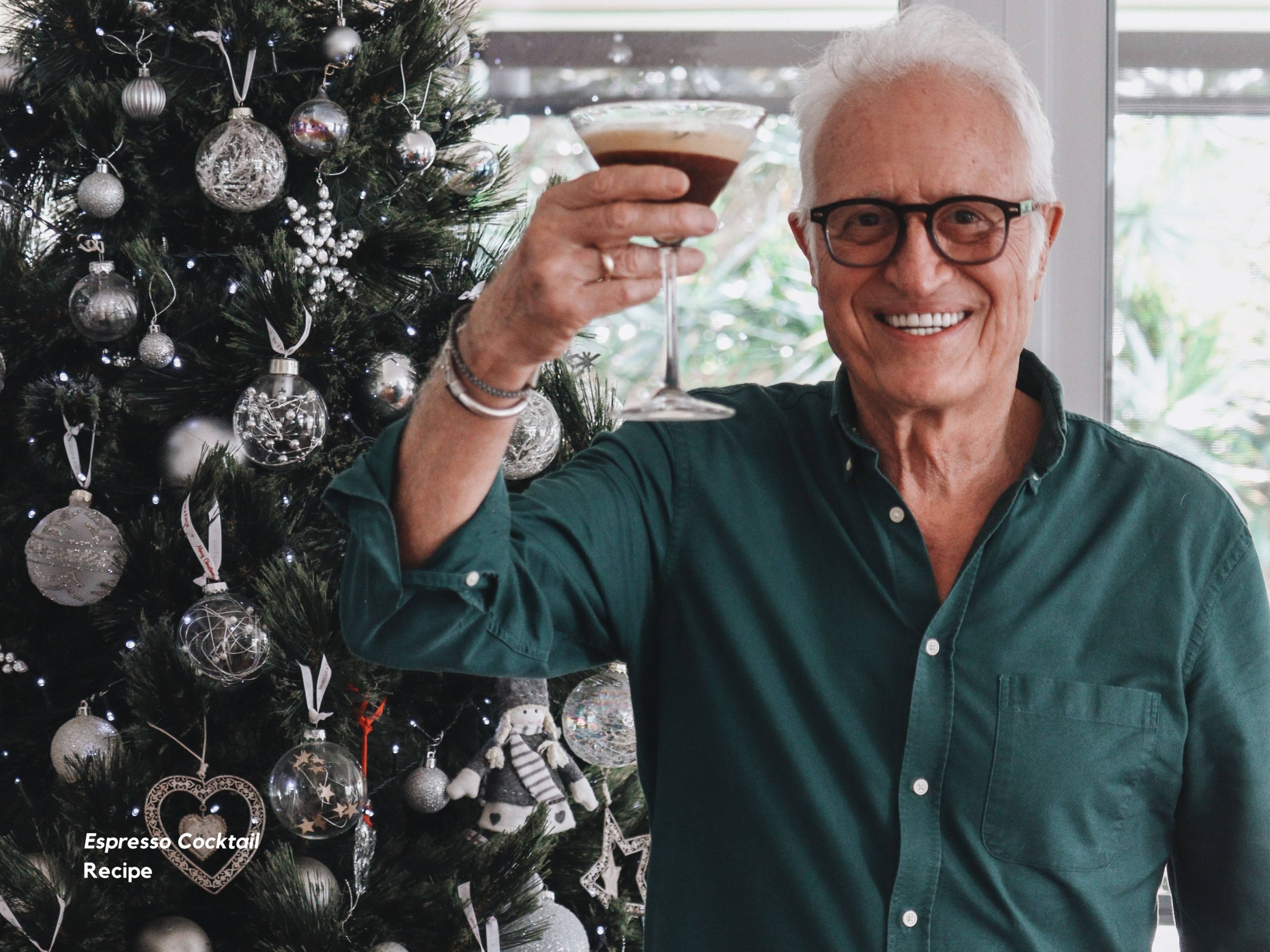 Man holding a cocktail drink made with Byron Bay Coffee